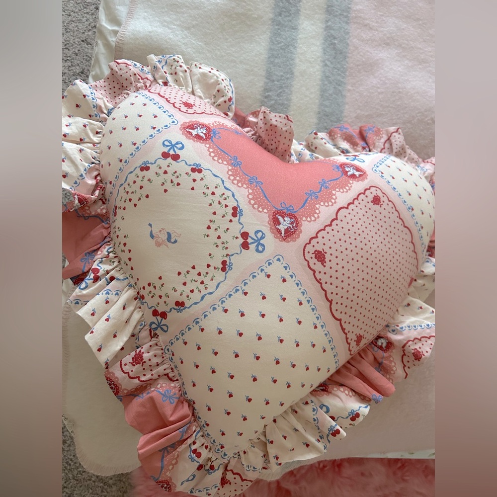 Heart-Shaped Patchwork Pillow urban outfitters